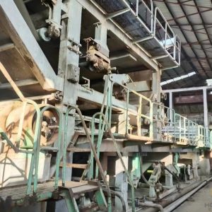 Used 2800/300m two-wire multi-dryers paper making machine with bottom wire 17.5m and top wire 7m, equipped with multi-cylinder dryer section for efficient paper production.