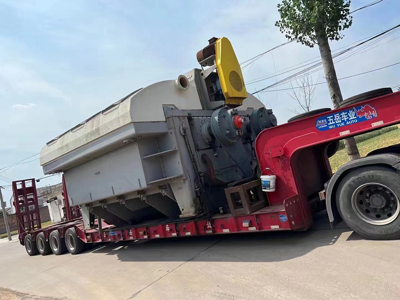 Qinyang Hongyu Machinery used papermaking equipment securely packaged and loaded into container for international shipping