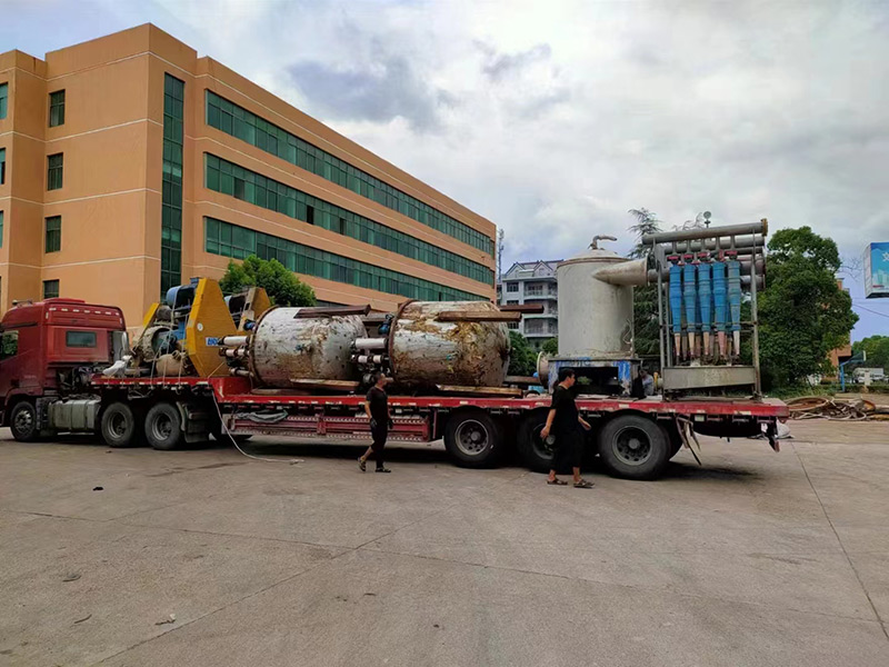 Qinyang Hongyu Machinery used papermaking equipment securely packaged and loaded into container for international shipping