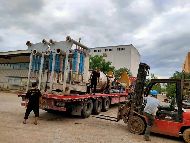Qinyang Hongyu Machinery used papermaking equipment securely packaged and loaded into container for international shipping