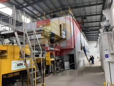 High-speed Crescent Former tissue paper making machine in a modern Chinese paper machinery factory
